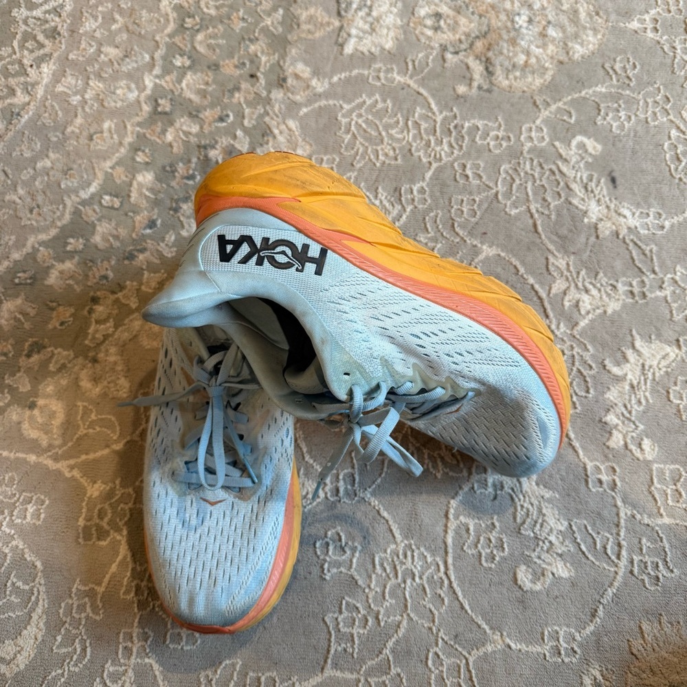 Hoka Woman’s Clifton 8 Shoes with Orange and Gray Highlights